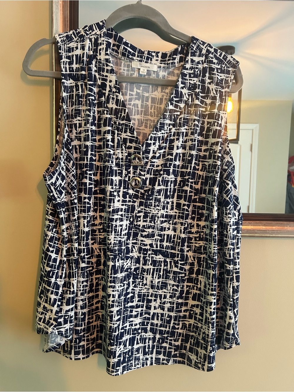 Madison Navy & White Sleeveless V-Neck Printed Blouse with Button Accent